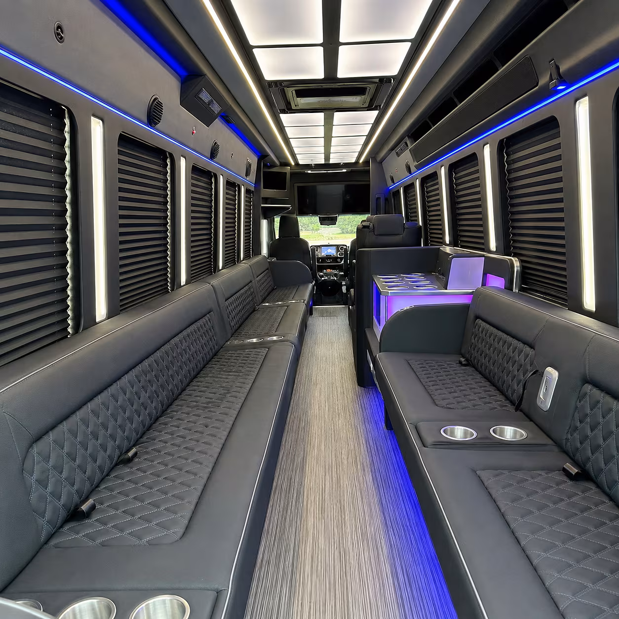 Group beside a Mercedes Sprinter limo in Seattle